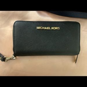 Wallet with wristband